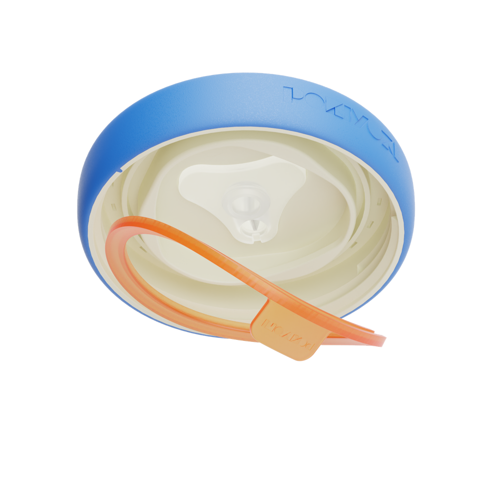 The removable inner seal lifting out of the magnetic lid